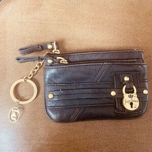 Juicy Couture Black  Leather Pouch with Gold Details used but looks great